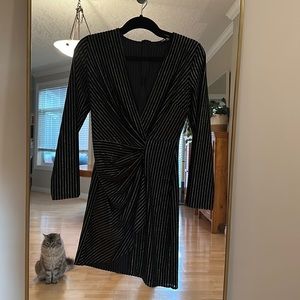 Black with gold glitter detail holiday party dress. Size small.